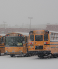 Snowy school busses.